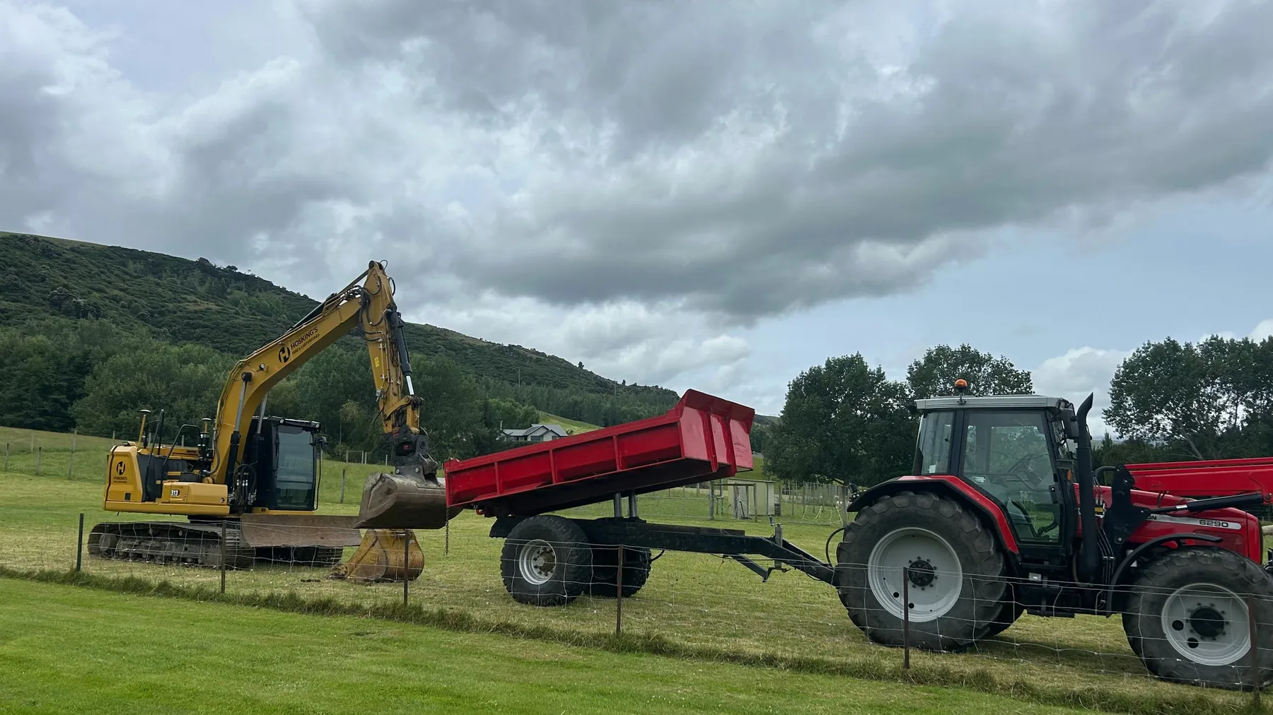 Excavator and tractor working on an Otago rural property